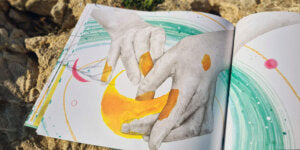 With the hands