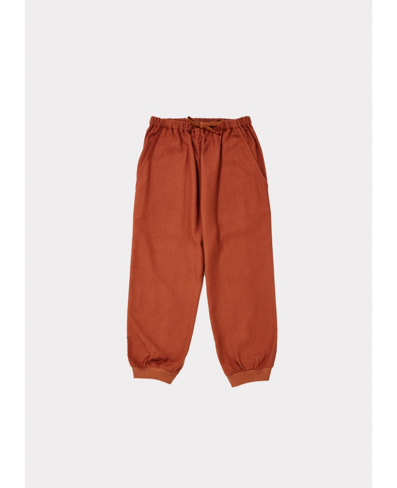 calças estilo aladino tijolo \ paprika cintura elástica, bolsos italianos, cordão na cintura, elástico nos tornozelos.